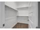 White closet with hanging rods and shelves at 5535 W St Moritz Ln, Glendale, AZ 85306