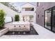 Luxurious backyard features a hot tub with a stone waterfall and water feature at 6850 E Joshua Tree Ln, Paradise Valley, AZ 85253