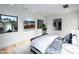 Serene bedroom featuring a modern bed, sleek decor, and ample natural light at 6850 E Joshua Tree Ln, Paradise Valley, AZ 85253
