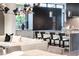 Stylish kitchen featuring an island with seating, modern appliances, and sleek design at 6850 E Joshua Tree Ln, Paradise Valley, AZ 85253