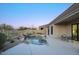 An outdoor pool and patio area with comfortable seating, ideal for enjoying outdoor living and entertaining at 11566 E Christmas Cholla Dr, Scottsdale, AZ 85255