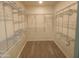 Large walk-in closet with wire shelving and hanging rods at 8606 N 32Nd Ave, Phoenix, AZ 85051