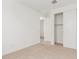 Bright bedroom featuring carpet, closet with sliding doors, and a neutral color scheme, ready for personalization at 12314 W Marguerite Ave, Avondale, AZ 85323