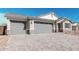 Charming home with a three-car garage and brick-paved driveway at 12314 W Marguerite Ave, Avondale, AZ 85323