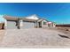 Charming home with a three-car garage and brick-paved driveway at 12314 W Marguerite Ave, Avondale, AZ 85323