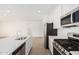 Spacious kitchen featuring stainless steel appliances, a large island, and eat-in space at 12314 W Marguerite Ave, Avondale, AZ 85323