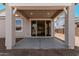 The covered patio has a large sliding door offering views into the home at 12314 W Marguerite Ave, Avondale, AZ 85323