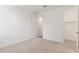 Spare bedroom with carpet flooring, white walls, and a closet at 12330 W Marguerite Ave, Avondale, AZ 85323