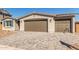 Lovely home featuring a three-car garage and a charming paver driveway at 12330 W Marguerite Ave, Avondale, AZ 85323