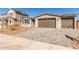 Inviting single-story home featuring a two-car garage and a beautifully paved driveway at 12330 W Marguerite Ave, Avondale, AZ 85323
