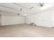 Spacious three car garage with room for storage and overhead lighting at 12330 W Marguerite Ave, Avondale, AZ 85323