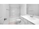 This bathroom features a tub, shower, single vanity, and tile floor at 25118 N 171St Ln, Surprise, AZ 85387