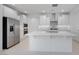 Beautiful kitchen with white cabinetry, stainless steel appliances, and a center island at 25118 N 171St Ln, Surprise, AZ 85387