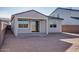 Covered patio in backyard perfect for outdoor enjoyment and entertaining at 25206 N 172Nd Ln, Surprise, AZ 85387