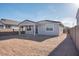 Backyard with a covered patio perfect for outdoor enjoyment at 25206 N 172Nd Ln, Surprise, AZ 85387