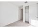 Bedroom features a closet with sliding doors at 25206 N 172Nd Ln, Surprise, AZ 85387