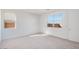 Bright bedroom with large windows providing natural light and views at 25206 N 172Nd Ln, Surprise, AZ 85387