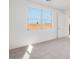 Cozy bedroom featuring carpet and a window at 25206 N 172Nd Ln, Surprise, AZ 85387