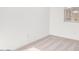 Cozy bedroom with neutral carpet and white walls, illuminated by natural light at 25206 N 172Nd Ln, Surprise, AZ 85387