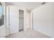 Bright bedroom featuring a closet with sliding doors at 25206 N 172Nd Ln, Surprise, AZ 85387
