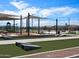 Community park featuring playground equipment, picnic tables, and cornhole, perfect for neighborhood gatherings and outdoor fun at 3337 E Alexander Dr, San Tan Valley, AZ 85143