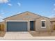 Inviting single-story home featuring a two-car garage, low-maintenance landscaping, and a charming front door at 3337 E Alexander Dr, San Tan Valley, AZ 85143