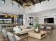 Open living room featuring kitchen, comfortable seating, natural light, and stylish decor at 3337 E Alexander Dr, San Tan Valley, AZ 85143