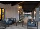 Relaxing outdoor patio with comfortable seating and stylish lighting offers a perfect space for entertaining at 3337 E Alexander Dr, San Tan Valley, AZ 85143