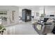 Open living space with fireplace feature, sleek floors, and an open floorplan at 9175 N 82 St, Scottsdale, AZ 85258