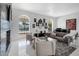 A bright living room featuring elegant decor, views of the pool, and a sleek modern design at 9175 N 82 St, Scottsdale, AZ 85258