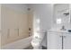 Clean bathroom with a bathtub, toilet, and vanity with a mirror at 1952 N 103Rd Dr, Avondale, AZ 85392