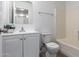 Clean bathroom, featuring a white vanity and bathtub at 1952 N 103Rd Dr, Avondale, AZ 85392