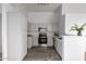 Modern kitchen with stainless steel appliances and light cabinets at 1952 N 103Rd Dr, Avondale, AZ 85392