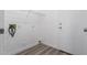 Laundry room with wire shelving and vinyl flooring at 1952 N 103Rd Dr, Avondale, AZ 85392
