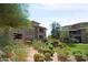 Residential building with manicured landscaping and lush plants at 20100 N 78Th Pl # 2143, Scottsdale, AZ 85255