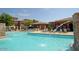 Large community pool with fountains and plenty of lounge chairs at 20100 N 78Th Pl # 2143, Scottsdale, AZ 85255