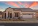 Charming single-story home with desert landscaping and a two-car garage at 10851 E Le Marche Dr, Scottsdale, AZ 85255