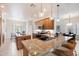 Modern kitchen with granite countertops, stainless steel appliances, and eat-in dining space at 10851 E Le Marche Dr, Scottsdale, AZ 85255