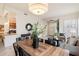 Open-concept living and dining area with tile flooring and modern decor at 10851 E Le Marche Dr, Scottsdale, AZ 85255