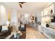 Well-lit living room merges with the kitchen, creating a spacious and modern living space at 10851 E Le Marche Dr, Scottsdale, AZ 85255