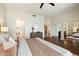 Serene main bedroom boasts hardwood floors, a spacious layout, and an adjacent bathroom at 10851 E Le Marche Dr, Scottsdale, AZ 85255