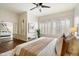 Cozy main bedroom with plantation shutters offers ample space and a serene atmosphere at 10851 E Le Marche Dr, Scottsdale, AZ 85255