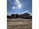 New construction home framing, showcasing a spacious design and modern rooflines at 18129 W Rancho Dr # 32, Litchfield Park, AZ 85340