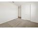 Bedroom with neutral carpet and doorway to adjoined room at 3649 E Alexander Dr, San Tan Valley, AZ 85143