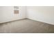 Bedroom with neutral carpet and bright natural light at 3649 E Alexander Dr, San Tan Valley, AZ 85143