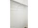 Walk-in closet featuring a sturdy hanging rod for optimal storage organization and simple design at 3649 E Alexander Dr, San Tan Valley, AZ 85143
