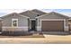 Charming single-story home with neutral paint, stone accents, and a two-car garage at 3649 E Alexander Dr, San Tan Valley, AZ 85143