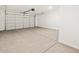 Spacious two-car garage with ample parking and storage space, ready for your vehicles and projects at 3649 E Alexander Dr, San Tan Valley, AZ 85143