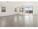 Spacious living area with tile flooring and a sliding glass door to the backyard for seamless indoor-outdoor flow at 3649 E Alexander Dr, San Tan Valley, AZ 85143