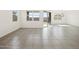 Open-concept living space with tile floors, natural light and sliding glass doors to the backyard, perfect for entertaining at 3649 E Alexander Dr, San Tan Valley, AZ 85143